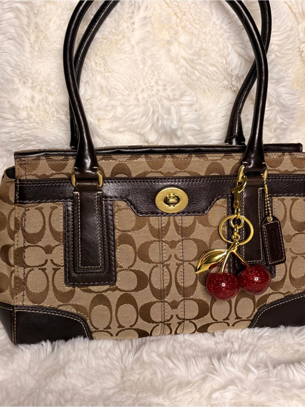 Coach Brown Signature Canvas Shoulder Tote with Red Cherry Charm